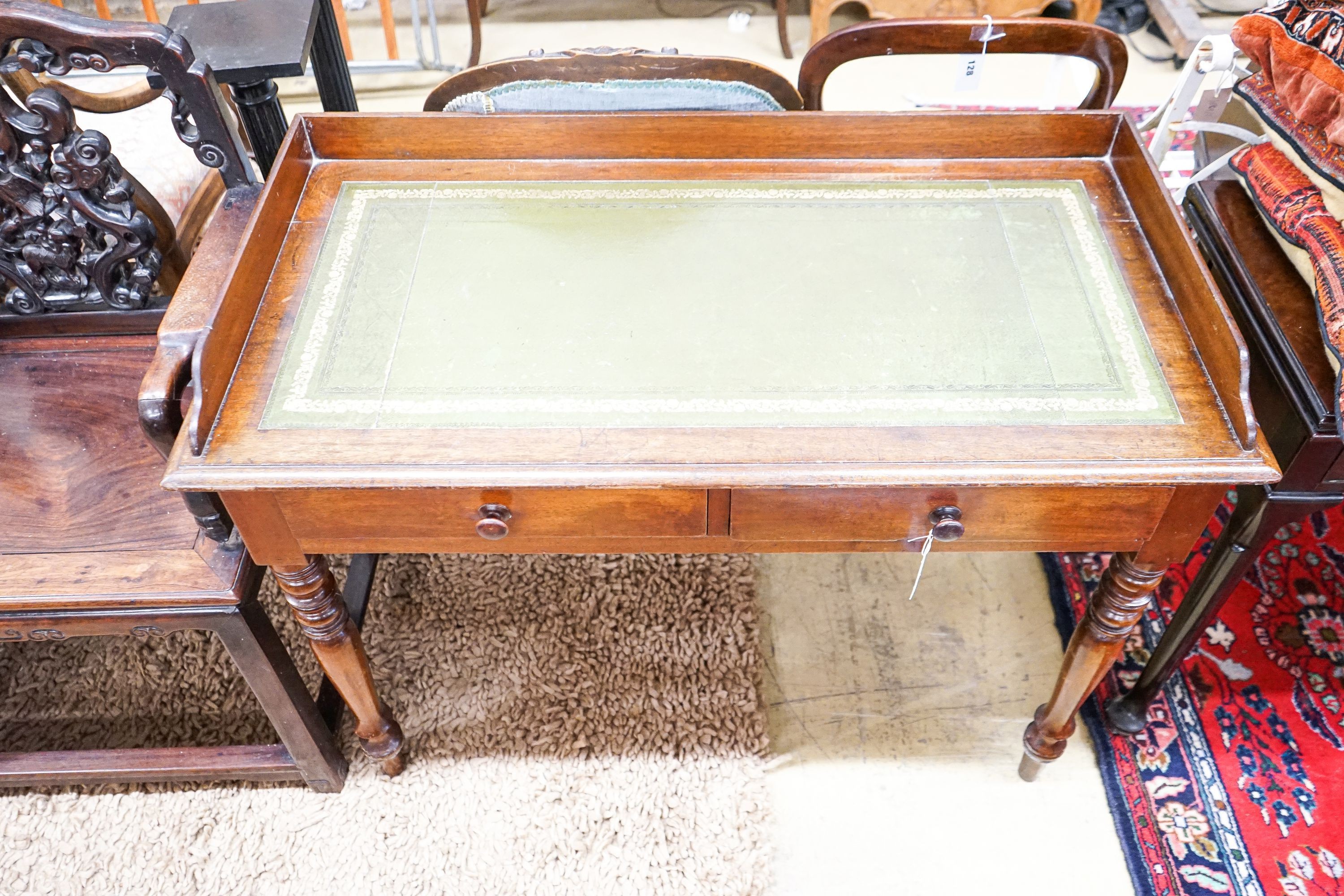 A Victorian mahogany two drawer writing table, length 106cm, depth 53cm, height 82cm